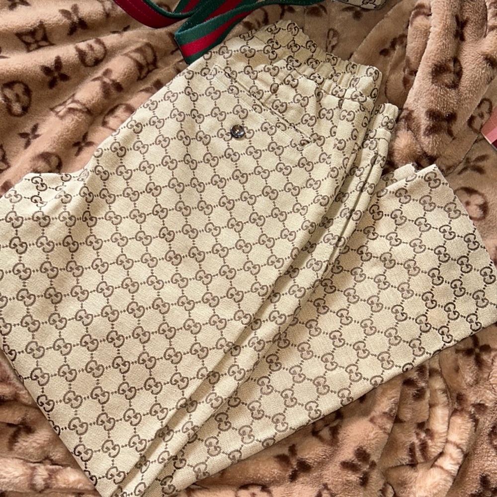 Gucci Gg Canvas Pants for men or women that they might fit.